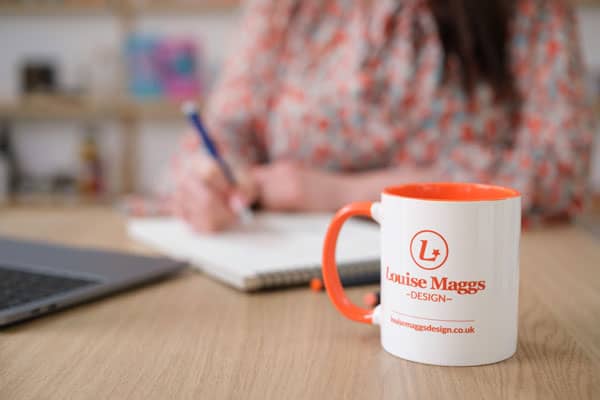 Louise Maggs Design logo on a mug Louise Maggs Design logo on a mug